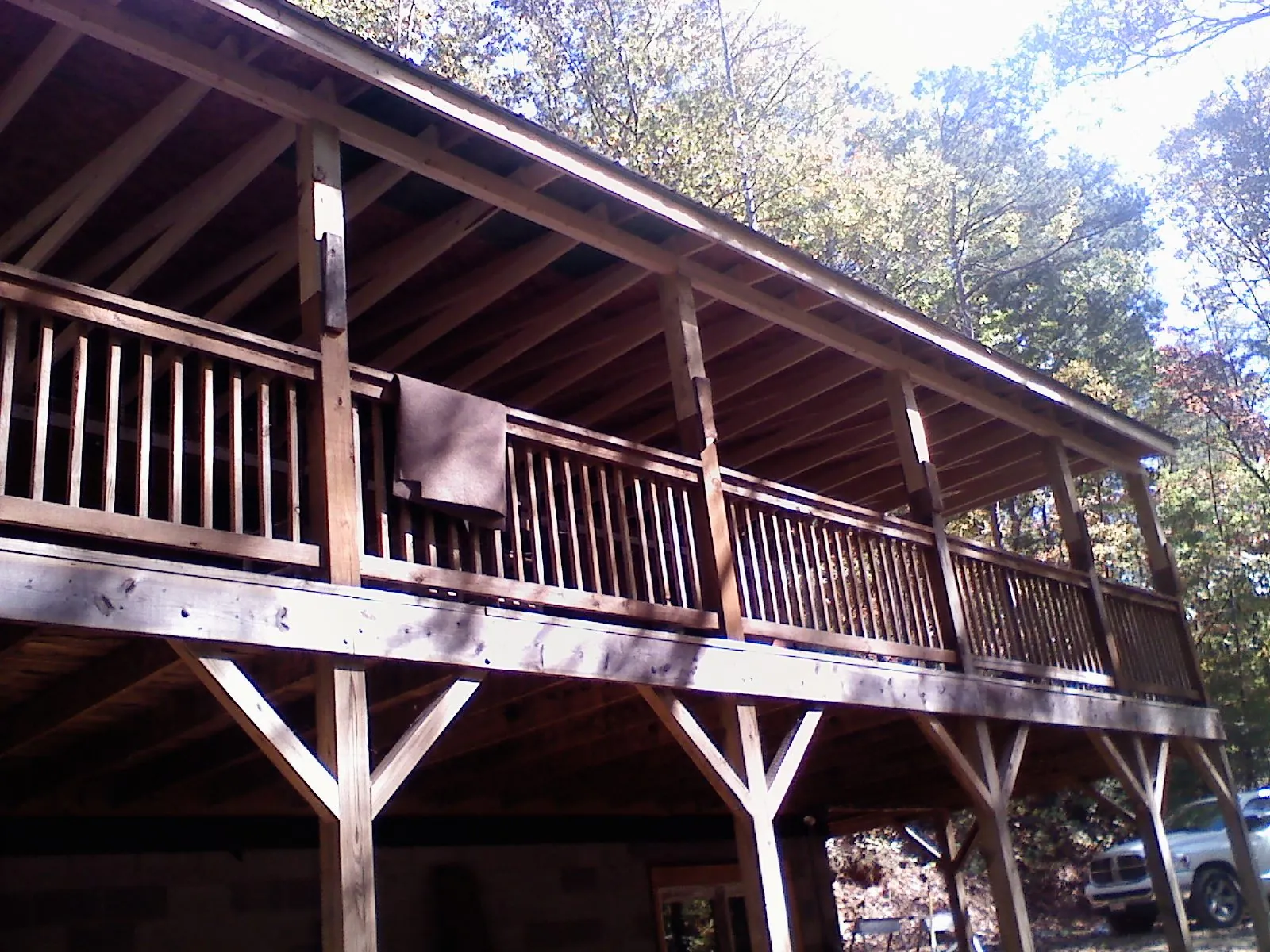 Timber framing under a new elevated porch and deck — Roof Leak Repair in Lyndeborough by Roofing Brothers